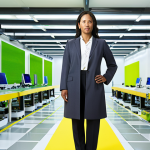 **Modern Textile Engineer: Strategic and Sustainable Evolution**
    A dynamic visual portraying a forward-thinking textile engineer (diverse gender/ethnicity, professional attire) confidently standing at the crossroads of a high-tech, clean factory floor and a bright, contemporary corporate boardroom. One side features sleek textile machinery and fabric rolls, while the other displays digital interfaces with sustainability metrics, supply chain data, and strategic graphs. Elements of nature (subtle green leaves) and technological lines intertwine throughout the scene, symbolizing the blend of innovation, eco-consciousness, and global vision. The overall mood is optimistic and professional.